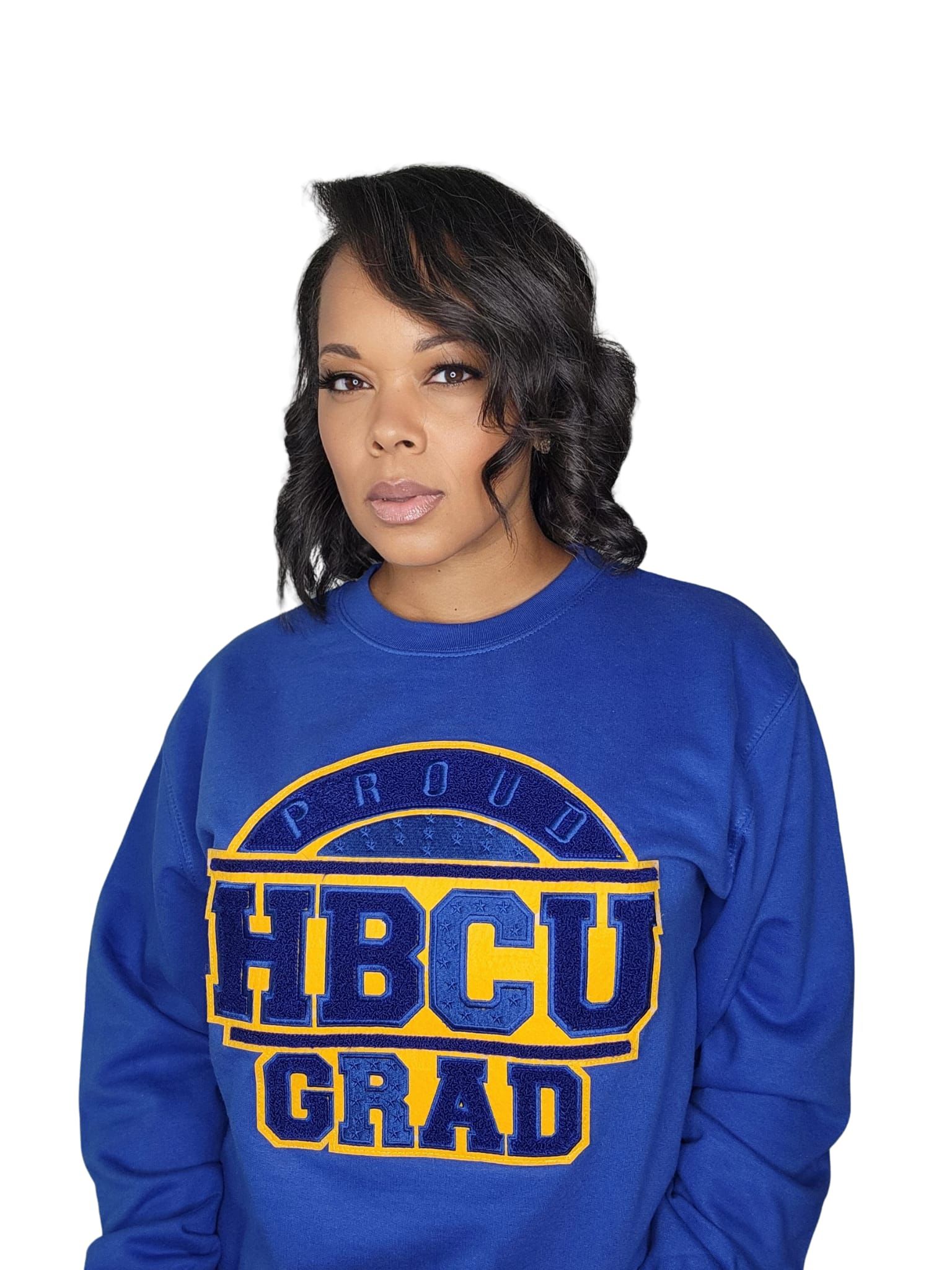 Women wearing PROUD HBCU GRAD sweater.