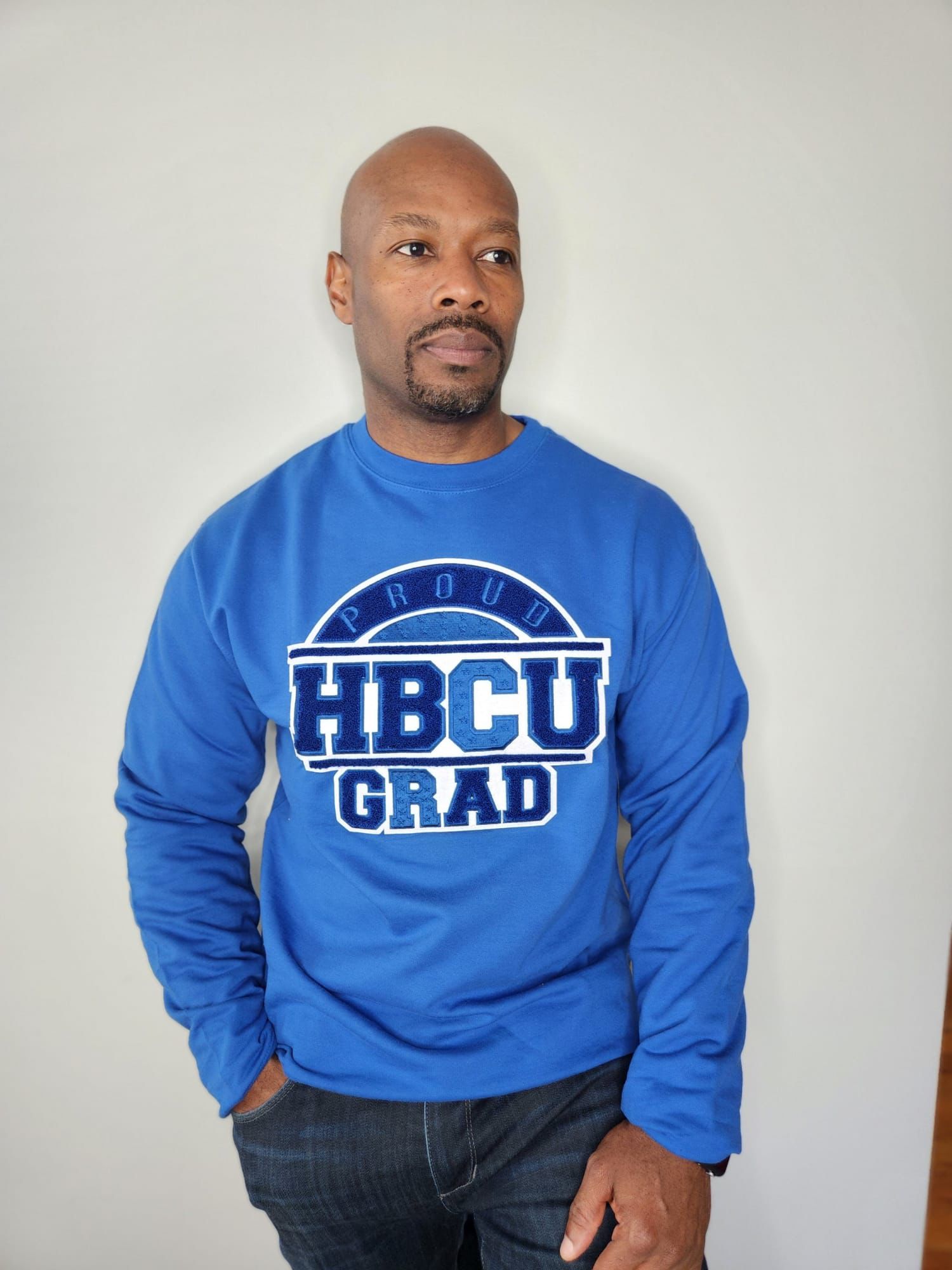 Man wearing blue and white HBCU sweater